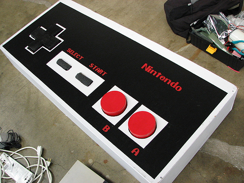This uses the same hardware as the original NES, a shift register to gather button states