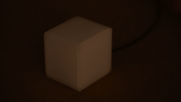 This Gif shows someone pressing the acrylic on the backside, turning the nightlight on and off again.