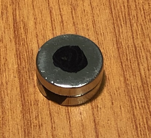 magnet with marked side facing up