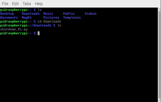 using a command in the terminal to navigate to the downloads