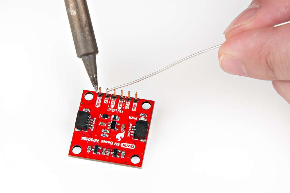 Soldering headers to the Qwiic 5V Boost.