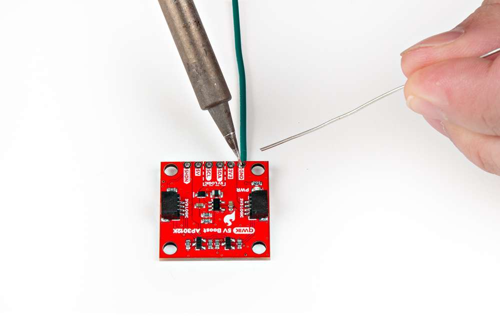Soldering wires to the Qwiic 5V Boost.