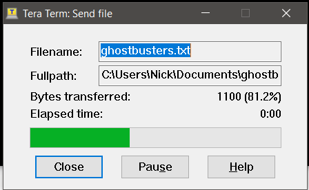 TeraTerm file transfer window transferring ghostbusters.txt at 80% with 0:00 elapsed time
