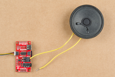 Inserting tinned speaker wires into the Qwiic MP3 Trigger