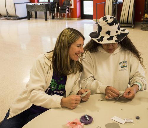 Girl Scout leaders working on the LilyPad firefly project