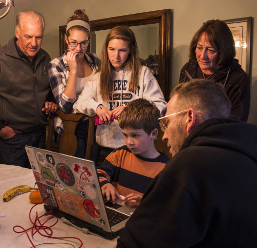 Kowal family learning about the MaKey MaKey