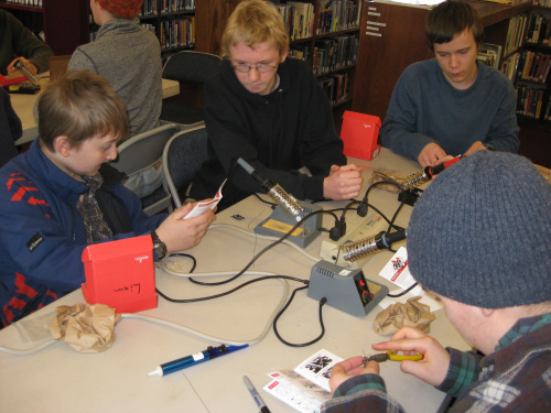 Students soldering