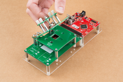 testbed for openlog with unique waffle top that includes precise pusher higher to mate with product and light sensor