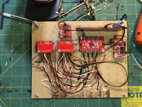 Copper cap pads soldered to cap slider breakout pins