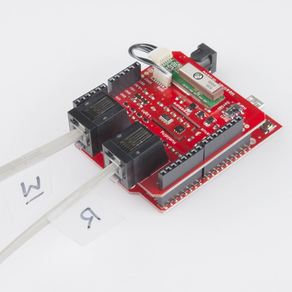 Weather shield with wind and rain meter