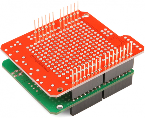 Shield to be soldered inserted into jig. Ready to solder.