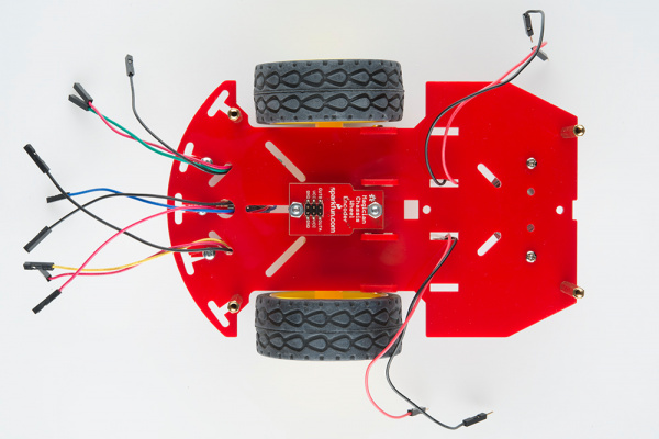 Stick the Line Followers' jumper wires through the chassis