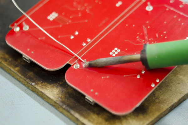 Hand soldering components