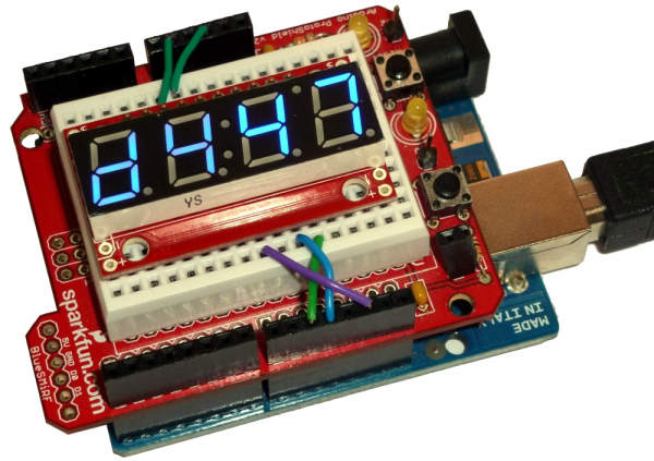 S7S with male headers soldered, in a breadboard