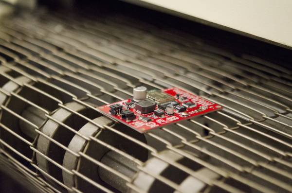 Board entering the reflow oven