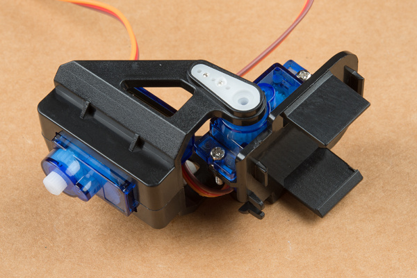 Pan and tilt mechanisms attached