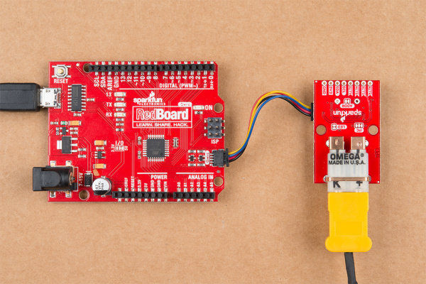 image of redboard with qwiic cable plugged into thermocouple qwiic connector