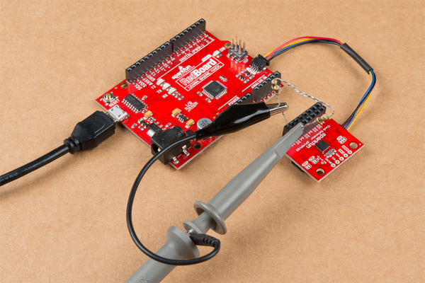 This image shows the Oscilloscope attached to teh resistors that are plugged into Clock Output one of the Clock Generator.