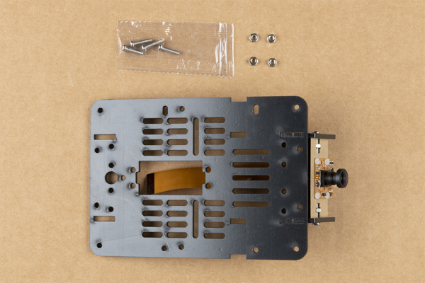 Camera mount fit into the rectangular cutouts on chassis base plate