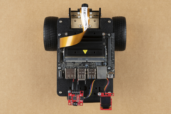 Qwiic Micro OLED mounted and connected to Qwiic Motor Driver