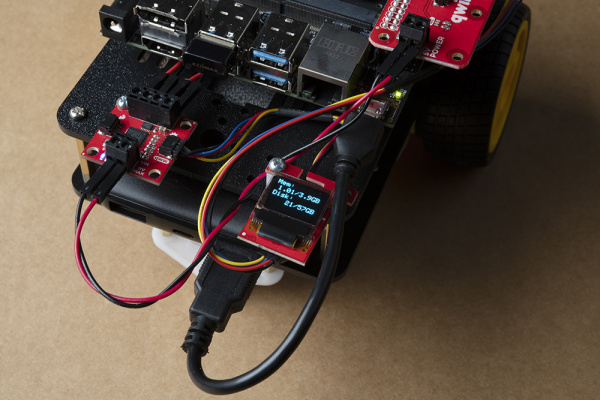 JetBot powered on and micro OLED displaying memory and disc space