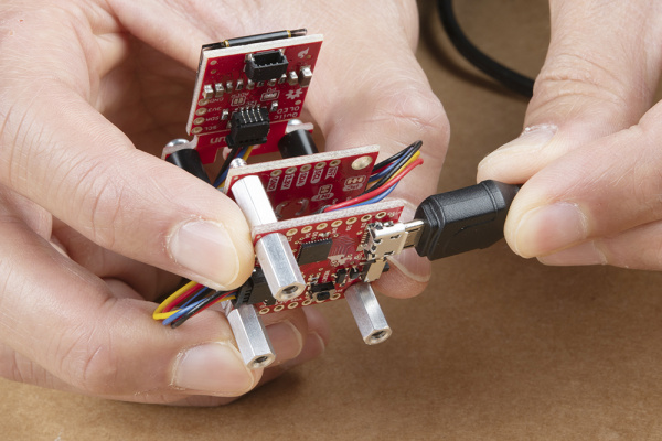 USB Cable connecting to the Qwiic Micro to Power and Program the Board