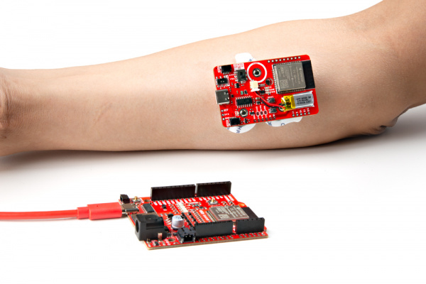 Muscle Sensor, Wireless Shield, and EMG Pads attached to the forearm