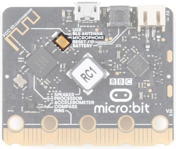 The microphone is on the back of the board, just below and left of the USB port