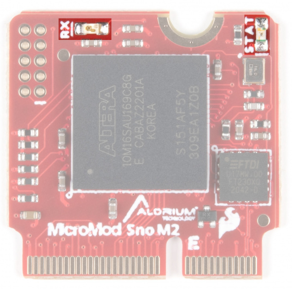 The RX LED is along the upper left side of the board, the STAT LED is on the upper right side of the board