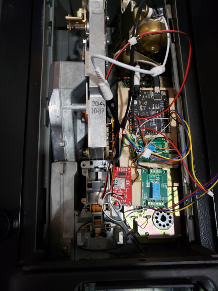 Electronics inside payphone housing