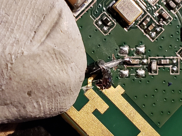 Antenna cable spot soldered to RF path