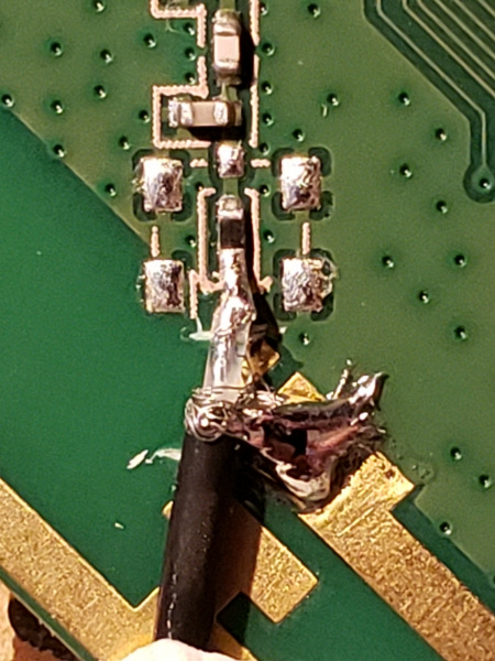 Spot soldering RF cable to 0402 components