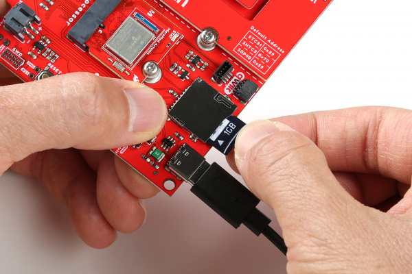 MicroSD Card Inserting into the MicroSD Card Socket