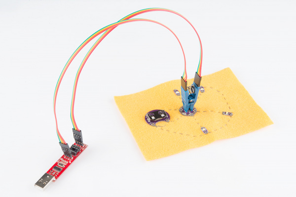 Tiny AVR Programmer Connected to surfacea mount ATtiny85 via the IC Test Clip