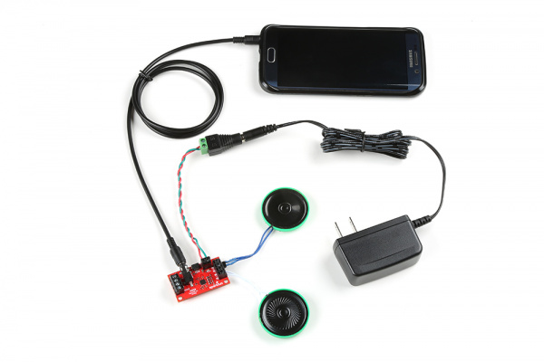 Smartphone Connected to Qwiic Speaker Amp, 5V Power Supply, and 8 Ohm Thin Speakers