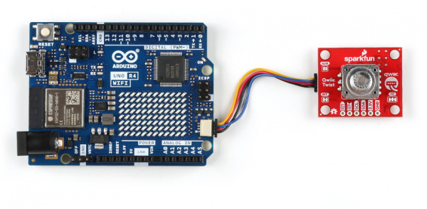 Plug one end of the qwiic connector into the qwiic port on the breakout board, and the other end into the qwiic connector on the Arduino Uno R4 WiFi board