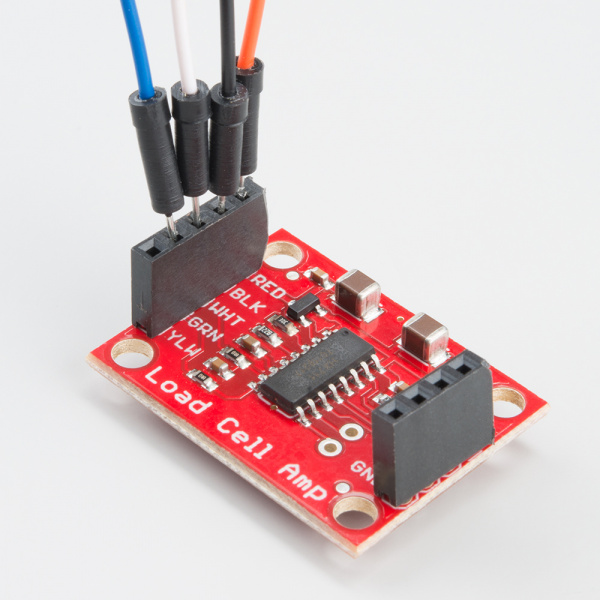 Strain gauge load cell hooked up to SparkFun's HX711 amplifier breakout board