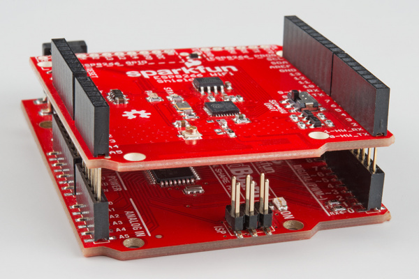 Tilt shield to avoid ISP header