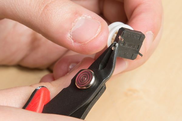 Cutting legs off of a breadboard push button