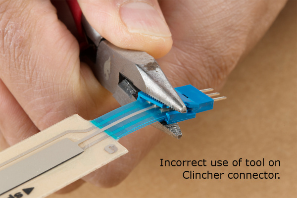 Pliers applied incorrectly to the Clincher connector.