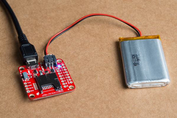 LiPo and USB plugged into and powering board