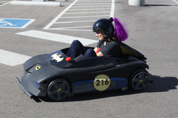 Smiling girl in power wheels