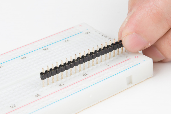 Putting headers in breadboard