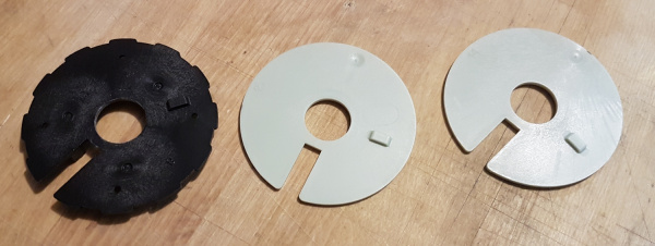 Combination lock discs with raised tabs