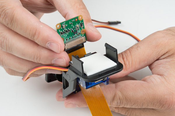 Threading the camera flex cable