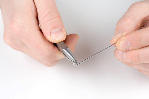 Bending paper clip