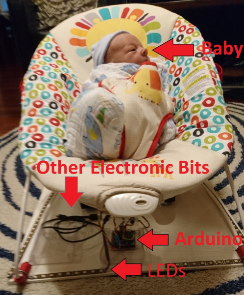 Baby in bouncy chair with Arduino