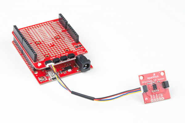 Qwiic Distance Sensor Connected to Qwiic Shield Stacked on RedBoard