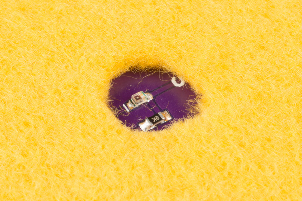 Hole cut in felt to allow sensor to take readings