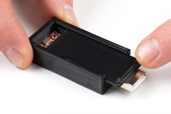 Slide the top into the case's grooves to make your USB stick